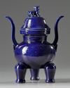 A Chinese blue-glazed tripod censer and cover