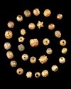 A FATIMID COLLECTION OF ORNATE GOLD BEADS, 11TH-13TH CENTURY