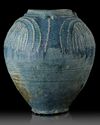 A POST SASSANIAN TURQUOISE GLAZED POTTERY STORAGE JAR, IRAN OR IRAQ, 7TH-8TH CENTURY
