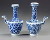 A PAIR OF BLUE AND WHITE EWERS, KANGXI PERIOD (1662-1722 )