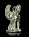 A SEATED BRONZE SPHINX, HELLENISTIC, 1ST-2ND CENTURY BC