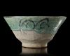 A KASHAN TURQUOISE AND BLACK POTTERY BOWL, PERSIA, 12TH-13TH CENTURY
