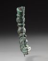A GREEK PHRYGIAN BRONZE ARM FIBULA BROOCH, CIRCA 6TH CENTURY B.C.