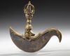 A GILT TIBETAN BRONZE KARTIKA OR VAJRA KNIFE, CIRCA 1900