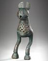 A BRONZE FINIAL IN THE FORM OF HARE, POSSIBLY FATIMID, 11TH-13TH CENTURY
