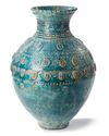 A POST SASSANIAN TURQUOISE GLAZED POTTERY STORAGE JAR, PERSIA, 7TH-8TH CENTURY