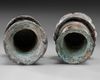 A PAIR OF ROMAN BRONZE AND SILVERED "FACE OF FEMALE" TERMINALS, CIRCA 2ND-3RD CENTURY AD