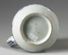 A JAPANESE BLUE AND WHITE JUG WITH SILVER COVER, 17TH CENTURY