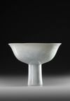 A CHINESE WHITE-GLAZED STEM BOWL, 17TH CENTURY