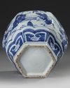 A CHINESE BLUE AND WHITE HEXAGONAL VASE, QING DYNASTY (1644-1911)