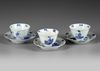 THREE CHINESE BLUE AND WHITE CUPS AND SAUCERS, KANGXI PERIOD (1662-1722)