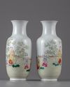 A PAIR OF CHINESE FAMILLE ROSE 'BOYS' VASES, 19TH-20TH CENTURY