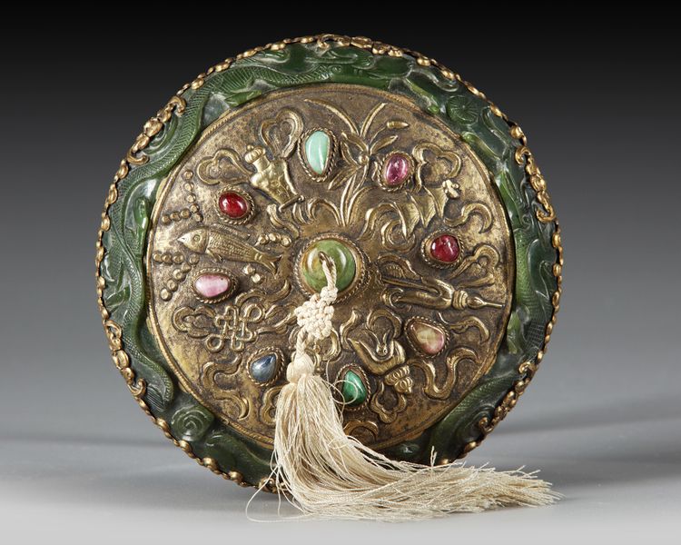 A CHINESE GILT-BRONZE SPINACH-GREEN JADE-INSET SCHOLAR'S MIRROR           