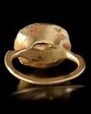 A ROMAN GOLD RING WITH A ROCK CRYSTAL INTAGLIO OF MINERVA, ROMAN, 1ST CENTURY AD