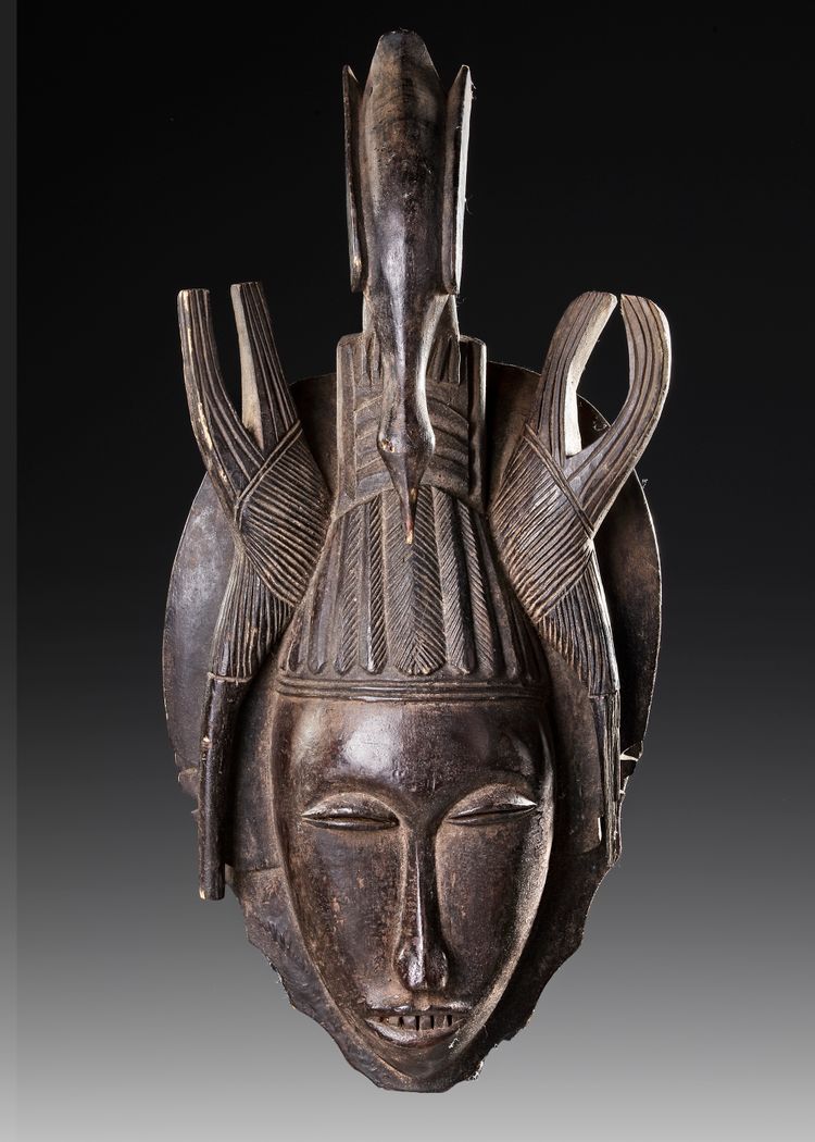 AN AFRICAN MASK WITH BIRD CREST, EARLY 20TH CENTURY