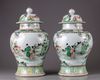 A pair of famille verte vases with cover