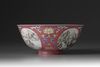 A famille rose ruby-ground medallion bowl