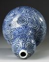 A JAPANESE BLUE AND WHITE  DOUBLE- GOURD SAKE VASE, WITH OCTOPUS AND KARAKUSA, LATE EDO PERIOD, 18TH CENTURY