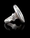 A PERSIAN CRYSTAL ROCK CARVED SILVER RING, 19TH CENTURY