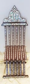 Two wooden mother of pearl inlaid chairs