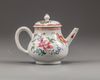 A Chinese famille rose teapot and cover