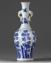 A Chinese blue and white twin-handled slender vase