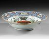 A CHINESE FAMILLE VERTE ‘PROVINCES’ ARMORIAL SHAVING BOWL, WITH THE ARMS OF GELDERLAND, CIRCA 1720