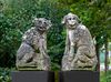 A PAIR OF CARVED LIMESTONE DOGS ('POORTWACHTERS'), FRANCE, 18TH CENTURY