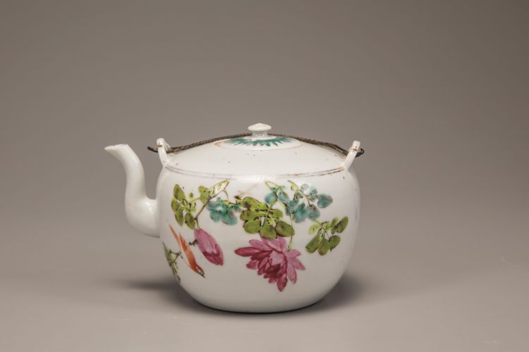 A famille rose 'birds and flowers' teapot and cover