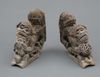 A rare set of two plain wooden corbels from Kyūshū with carved Chinese lions (karashishi)