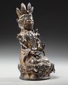 A GILT CHINESE BRONZE FIGURE OF GUANYIN, MING DYNASTY (1368-1644)