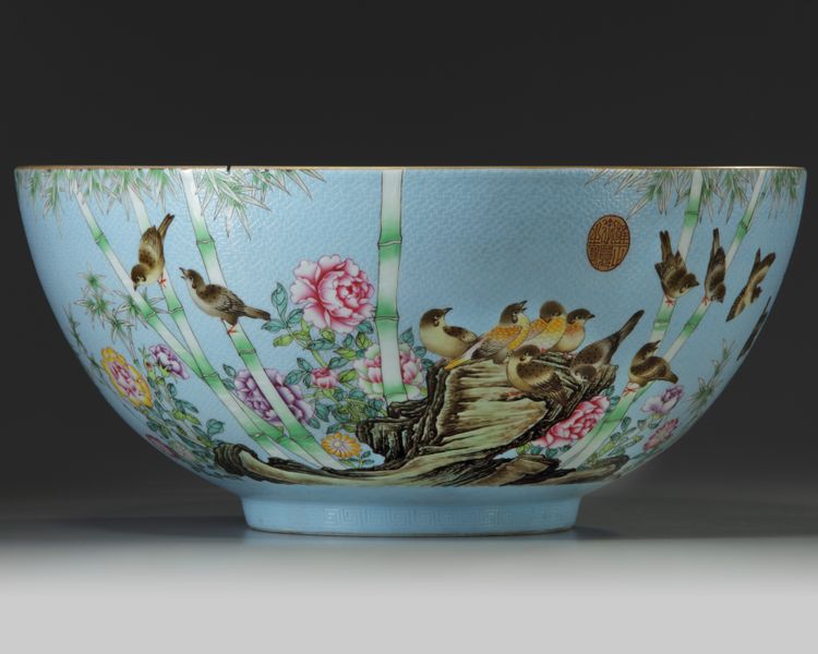 A large Chinese sgraffiato pale-blue-ground famille rose punch bowl