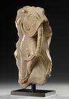 A CHINESE SANDSTONE FIGURE OF A STANDING BODHISATTVA, TANG DYNASTY (618-906 AD)