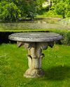 A CARVED LIMESTONE GARDEN TABLE IN THE EARLY 19TH CENTURY STYLE, SECOND HALF 20TH CENTURY