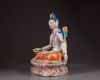A Chinese famille rose figure of Avalokitesvara on a double lotus base
