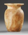 AN EGYPTIAN ALABASTER VASE, 26TH DYNASTY OR LATER