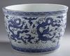 A massive Chinese blue and white 'nine dragons' jardiniere