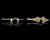A PAIR OF THURINGIAN GILT SILVER RADIATE-HEADED BROOCHES, 5TH-6TH CENTURY AD