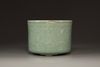A Chinese celadon glazed tripod censer