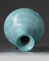 A Chinese turquoise-ground slip-decorated bottle vase