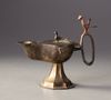A SELJUK BRONZE OIL LAMP, CENTRAL ASIA, 12TH-13TH CENTURY