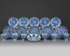 A group of Chinese blue and white cups and saucers