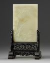 A CHINESE CELADON JADE 'GUANYIN' TABLE SCREEN, QING DYNASTY (1644-1911)