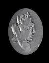 A DARK AGATE INTAGLIO, WITH HEAD OF TYCHE, 1ST CENTURY AD
