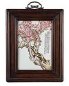 A Chinese famille rose 'prunus' plaque