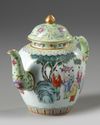 A CHINESE FAMILLE ROSE 'BOYS' TEAPOT AND COVER, 19TH-20TH CENTURY