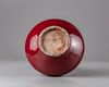 A Chinese= red glazed bottle vase