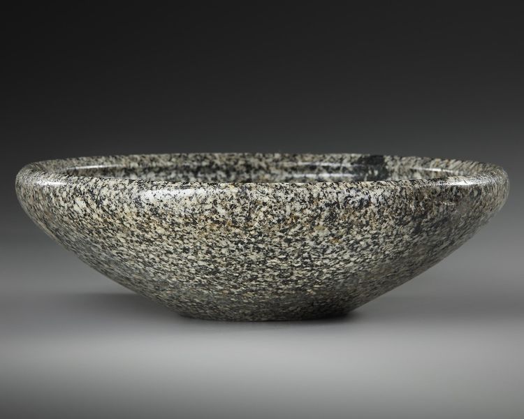 AN EGYPTIAN GRANITE BOWL, EARLY DYNASTIC, DYNASTY I-III, 2920-2575 B.C.