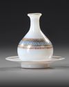 A SMALL FRENCH OPALINE PERFUME BOTTLE ON A DISH, EARLY 19TH CENTURY