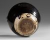A CHINESE CIZHOU-TYPE BLACK-GLAZED JAR